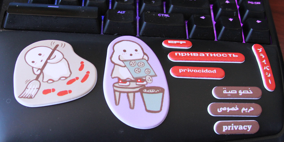Choose a Puffy Multisticker Sheet set when you join EFF. Puffy privacy Ghostie stickers on a keyboard